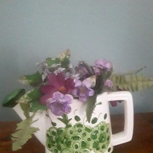 Vintage Ceramic Watering Can Planter with Raised Floral Motif and Silk Flowers